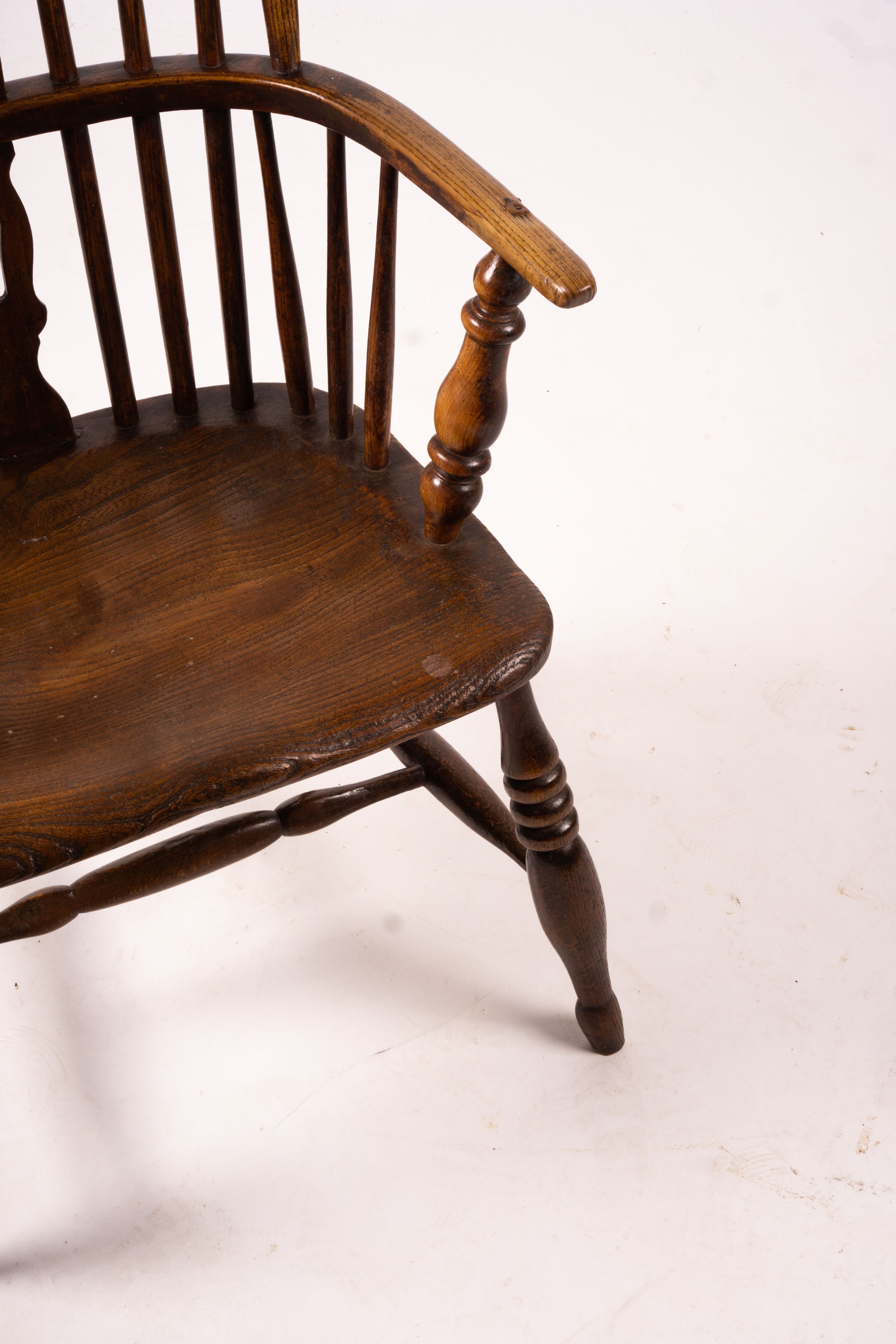 An early 19th century ash, elm and fruitwood Derbyshire area Windsor armchair with 'H' stretcher, width 56cm, depth 44cm, height 106cm